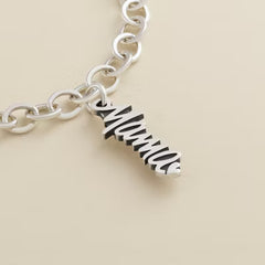"Mama" Charm